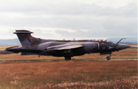 XV333 @ EGQS - Buccaneer S.2B of 208 Squadron preparing to join the active runway at Lossiemouth in May 1991. - by Peter Nicholson