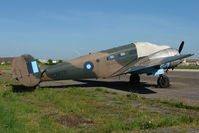 G-BKGM @ EGTU - Stored Beech Expeditor at Dunkeswell - by Terry Fletcher