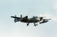 62-5890 @ EGQS - OV-1D Mohawk of the US Army's 3rd Military Intelligence Battalion on final approach to RAF Lossiemouth in September 1989. - by Peter Nicholson