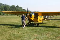 N6234H @ OH36 - Hand-prop start for Young Eagle rides at the Zanesville Riverside EAA breakfast fly-in. - by Bob Simmermon