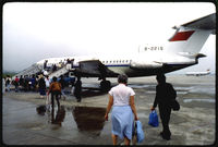 B-2215 @ ZGGG - Chinese passengers and Western tourists walk toward one of CAAC's British-built Trident jets, B-2215, in order to board a flight from Guangzhou to Guilin. Taken at Guangzhou Baiyun International Airport in May of 1986. Scanned from a Kodachrome slide. - by Alfred Holden