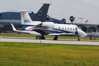 N264FX @ LAL - Departing Lakeland, Florida during Sun N Fun 2010