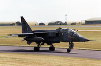 XX150 @ EGQS - Jaguar T.2A of 226 Operational Conversion Unit taxying to the active runway at RAF Lossiemouth in the Summer of 1990. - by Peter Nicholson