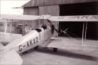 G-AKXO - This is G-AKXO when it was in use as a trainer at Sherburn in Elmet in Yorkshire, in 1956.  My eldest brother (indistinct picture behind) qualified in this Tiger Moth before he died as a result of a rugby accident later that year.  Sorry about the poor qu - by Not Known