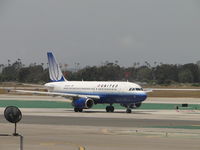N804UA @ LAX - Taxiing to runway 24L - by Helicopterfriend
