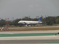 N589JB @ LAX - Landing runway 24R - by Helicopterfriend