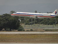N822AE @ LAX - Landing runway 24R - by Helicopterfriend