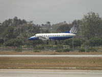 N562SW @ LAX - United Express operated by SKY West Airlines, landing on runway 24R - by Helicopterfriend