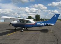 N9186T @ KAXN - Cessna T210M Centurion on the line. - by Kreg Anderson