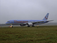 G-BYAT @ EDI - Thomson B757 Taxiing to runway 06 - by Mike stanners