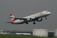 OE-LBA @ EBBR - Flight OS352 is taking off from RWY 07R - by Daniel Vanderauwera