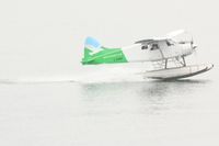 C-FEBE @ CYVR - Sea Plane landing in front of the Stanley park , Pacific Ocean - by Shubhashish