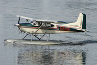N1802R @ LHD - 1974 Cessna A185F, c/n: 18502518 on Lake Hood - by Terry Fletcher