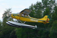 N51446 @ LHD - 1966 Cessna 305A, c/n: 2013 landing at Lake Hood