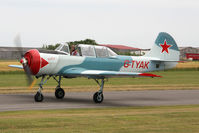 G-TYAK @ EGBR - Bacau Yak-52 at Breighton Airfield in June 2010. - by Malcolm Clarke