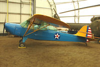 N47648 @ LHD - 1943 Taylorcraft DCO-65, c/n: 5416 preserved at the Alaska Aircraft Heritage Museum on Lake Hood - by Terry Fletcher
