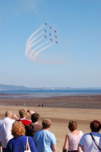 XX260 - Off airport. The Red Arrows arriving in Diamond Nine formation at the Welsh Festival of the Air, Swansea Bay, Wales, UK in September 2007 - by Roger Winser