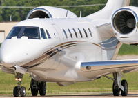 N577JC @ KDPA - Calamos Cessna 750 Citation X, operating as Delta Air Elite Business Jets Elite Jet ELJ577 arriving at KDPA after a full day flying from KSMO-KEKM-KDPA.