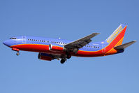 N694SW @ LAS - Southwest Airlines N694SW (FLT SWA234) from Norman Y Mineta San Jose Int'l (KSJC) on short final to RWY 25L. - by Dean Heald
