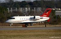 N91MG @ ORF - A quite bright CL-600 taxiing for takeoff - by Paul Perry