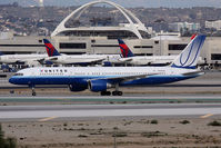 N595UA @ LAX - United Airlines N595UA (FLT UAL817) on the center taxiway after arrival from San Francisco Int'l (KSFO) on RWY 25L. - by Dean Heald
