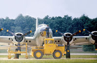 N7227C @ IAD - B-17G of the Confederate Air Force receiving loving care and attention at Transpo 72 at Dulles Intnl Airport in June 1972. - by Peter Nicholson