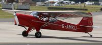 G-AMKU @ EGXW - departing after the airshow - by Paul Lindley