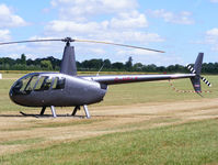 G-HFLY @ EGBT - Helifly (UK) Ltd Robinson R44 Raven II - by Chris Hall