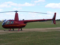 G-OPMP @ EGBT - Robinson R44 Raven II - by Chris Hall