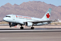 C-FZUJ @ LAS - Air Canada C-FZUJ landing RWY 25L. - by Dean Heald