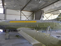 61-2490 @ IGM - JetStar undergoing exterior restoration at Straube's in Kingman, AZ - by Russ Whitlock