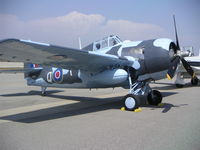 N5833 @ KHHR - Grumman FM-2 (F4F-8) Wildcat,  N5833 (c/n 5877 / BuNo 86819) on the ramp at Air Faire 2004 KHHR.