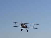 N65124 @ SZP - 1943 Boeing Stearman A75N1 'Spirit of OPEC', P&W R-985 450 Hp (by Jacobs) upgrade, Squared wingtips, Restricted Experimental class. On final Rwy 22 after towing N6230L Schweizer glider aloft - by Doug Robertson