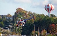 N94TV @ KGMU - Taking off from the downtown airport. - by Wade DeNero