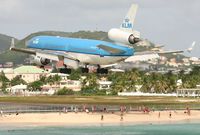 PH-KCK @ TNCM - KLM PH-KCK over Maho beach at TNCM for runway 10 - by Daniel Jef