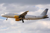 EC-HQL @ EGLL - Vueling Airlines - by Chris Hall