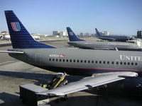 N202UA @ KLAX - United Airlines Boeing 737-322, N202UA at gate 70B (center) KLAX. - by Mark Kalfas