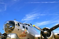 N5017N @ KCID - Beautiful sky as background for the nose art