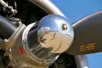N5017N @ KCID - Number 2 engine. Prop spinner reflects the nose of the aircraft, and me taking the photo!