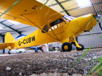 G-CUBW @ X3HH - shot from under the hangar door at Hinton in the Hedges - by Chris Hall