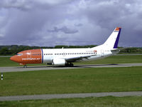 LN-KKE @ EDI - Norwegian air shuttle B737 Taxiing to runway 06 - by Mike stanners