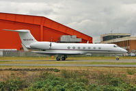 N234DB @ EGGW - 2006 Gulfstream Aerospace GV-SP (G550), c/n: 5106 about to depart Luton for Dublin - by Terry Fletcher