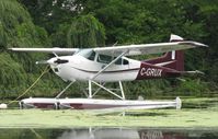 C-GRUX @ 96WI - Cessna 180K Skywagon moored at AirVenture 2010. - by Kreg Anderson