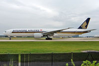 9V-SWD @ EGCC - Singapore Airlines 2006 Boeing 777-312ER, c/n: 34569 departs from Manchester UK - by Terry Fletcher