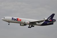N576FE @ EDDF - FedEx on short finals - by Robert Kearney
