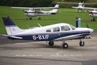 G-BXIF @ EGCB - 1976 Piper PIPER PA-28-181, c/n: 28-7690404 refuels at City of Manchester Airport