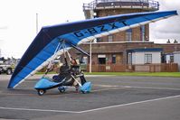 G-BZXT @ EGCB - Pre-flight checks for 2001 Mainair Sports Ltd MAINAIR BLADE 912, c/n: 1286-0501-7-W1081