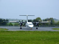 G-ECOI @ EDI - Flybe Dash8Q-402 taxiing off runway 24 - by Mike stanners