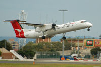 VH-QOE @ YSSY - At Sydney - by Micha Lueck