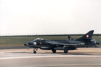 J-4021 @ EGDM - Hunter F.58 of the Patrouille Suisse aerobatic team lining up for take-of at the 1990 Boscombe Down Battle of Britain 50th Anniversary Airshow. - by Peter Nicholson